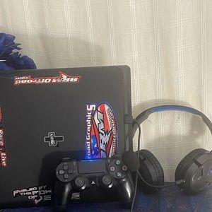 PS4 pro with headwear and controller